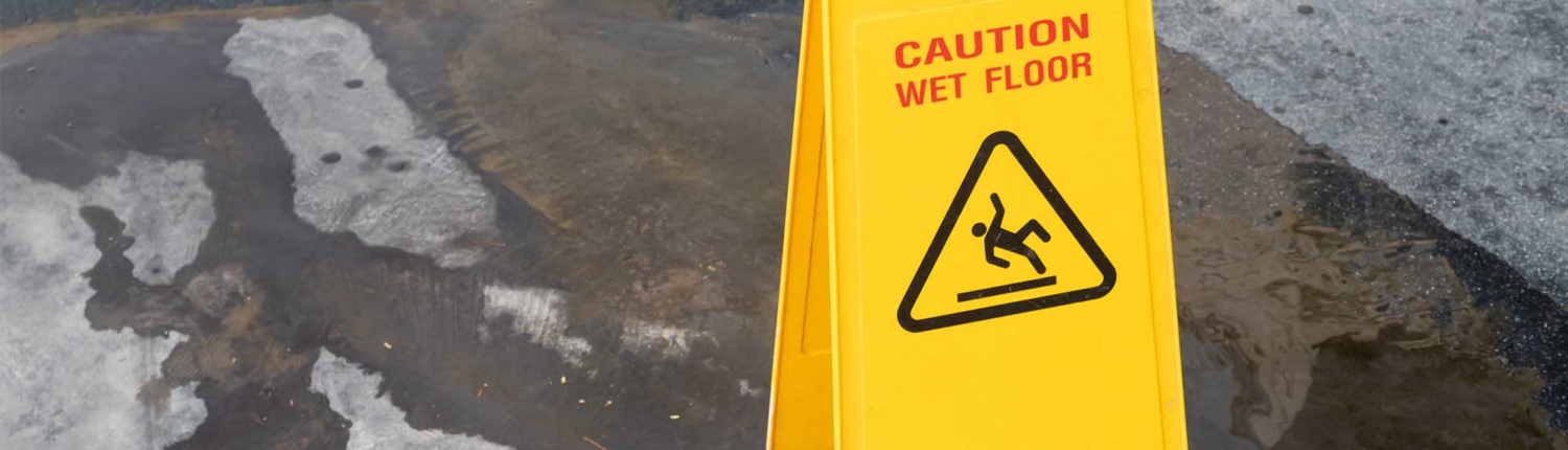 caution sign on wet concrete